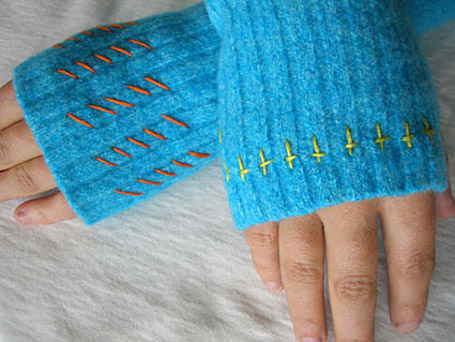Stitching detail on blue arm warmers by Gaye Abandon