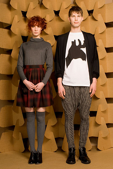 HER: Heart Turtleneck Long Sleeve Sweater (Charcoal) & Pleated Twist Pocket Skirt (Red Fade Check) and HIM: Soft Drape Cardigan (Black Modal), Moosehead T-shirt (White) & Baggy Pants (Cable Knit Print) by Limedrop HER: Heart Turtleneck Long Sleeve Sweater (Charcoal) & Pleated Twist Pocket Skirt (Red Fade Check) and HIM: Soft Drape Cardigan (Black Modal), Moosehead T-shirt (White) & Baggy Pants (Cable Knit Print) by Limedrop