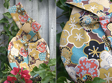 Carrot & Poppy Seed Wristlet by Meringue - back and detail views Carrot & Poppy Seed Wristlet by Meringue - back and detail views
