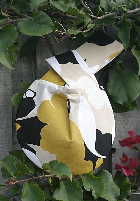 Lemon Tea Cake Wristlet by Meringue - front view Lemon Tea Cake Wristlet by Meringue - front view