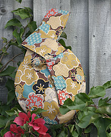 Carrot & Poppyseed Fabric Wristlet by Meringue Carrot & Poppyseed Fabric Wristlet by Meringue