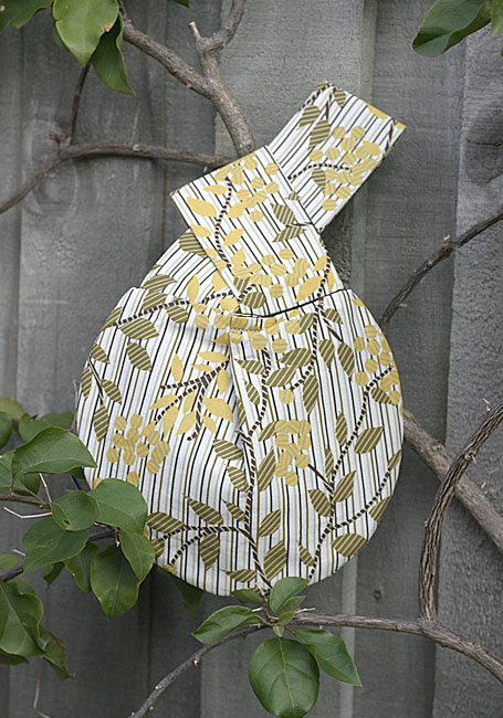 Wattle Seed Wristlet by Meringue - front view Wattle Seed Wristlet by Meringue - front view
