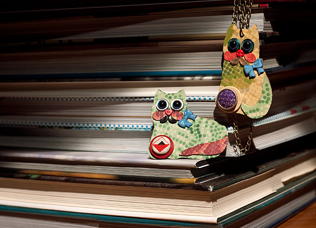 Claude Pussycat Lino Badge and Pedro Puss Lino Pendant by Betty Jo