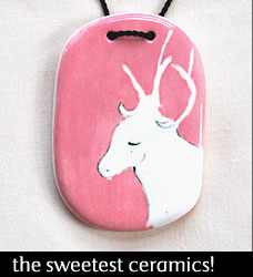 'A small pause in time' hand painted ceramic pendant 40x55mm from Linogirl 'A small pause in time' hand painted ceramic pendant 40x55mm from Linogirl